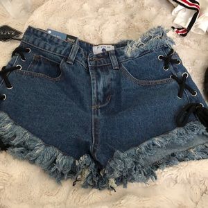 ribbed jean shorts with black ties on the side